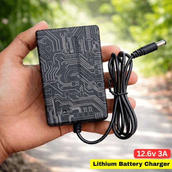 RC Product BD 12.6V 3A Lithium Battery Charger Short Description 12.6V 3A high-efficiency lithium battery charger for 12V (3S) battery packs. Fast 33W output with auto cut-off, LED indicator, and advanced safety protection. Ideal for lithium batteries and mini UPS charging. 📦 Product Description RC Product BD 12.6V 3A Lithium Battery Charger is a high-quality charger designed for 12V (3S) lithium-ion battery packs. It provides a stable 12.6V output with 3A current (≈33W) for fast and efficient charging. This charger uses advanced CC/CV charging technology to ensure safe and controlled charging, helping to extend battery lifespan. It features a full automatic cut-off system, where the LED indicator shows red during charging and turns green when fully charged, preventing overcharging. It is also suitable for charging mini UPS devices, making it a versatile solution for backup power systems. Built-in safety protections including overcurrent, overload, and short circuit protection ensure reliable and secure daily use. ________________________________________ 🔑 Key Features • Output: 12.6V 3A (≈33W Fast Charging) • Suitable for 12V (3S) Lithium-Ion Batteries • Smart CC/CV Charging System • Auto Cut-Off Function • LED Indicator (Red = Charging, Green = Full) • Compatible with Mini UPS • Multiple Safety Protection • Wide Input Voltage: 100V–240V AC